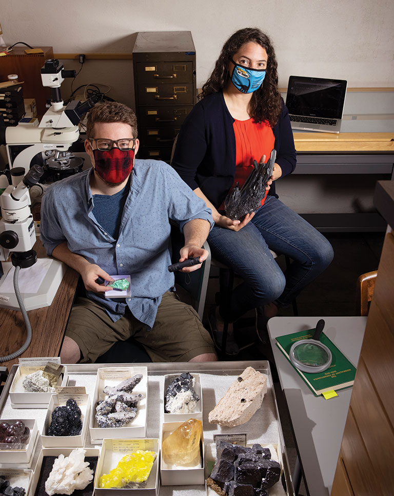 Travis Olds and Carla Rosenfeld posing behind the scenes at the Natural History museum.