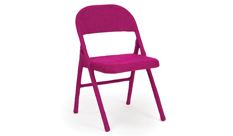 A folding chair wrapped in a bright-colored material