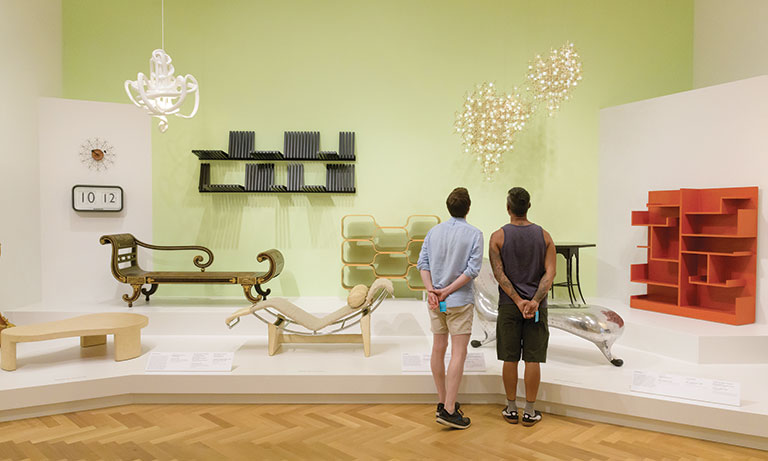 Two men looking at an art installation