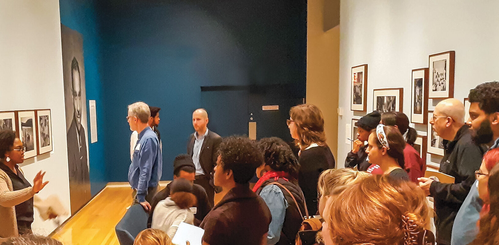 A woman giving a talk to a group of people