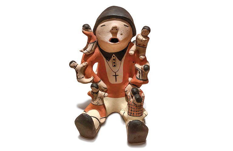 A figure holding smaller figures