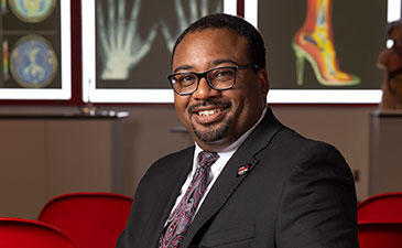 Headshot of Marcus Hartshaw