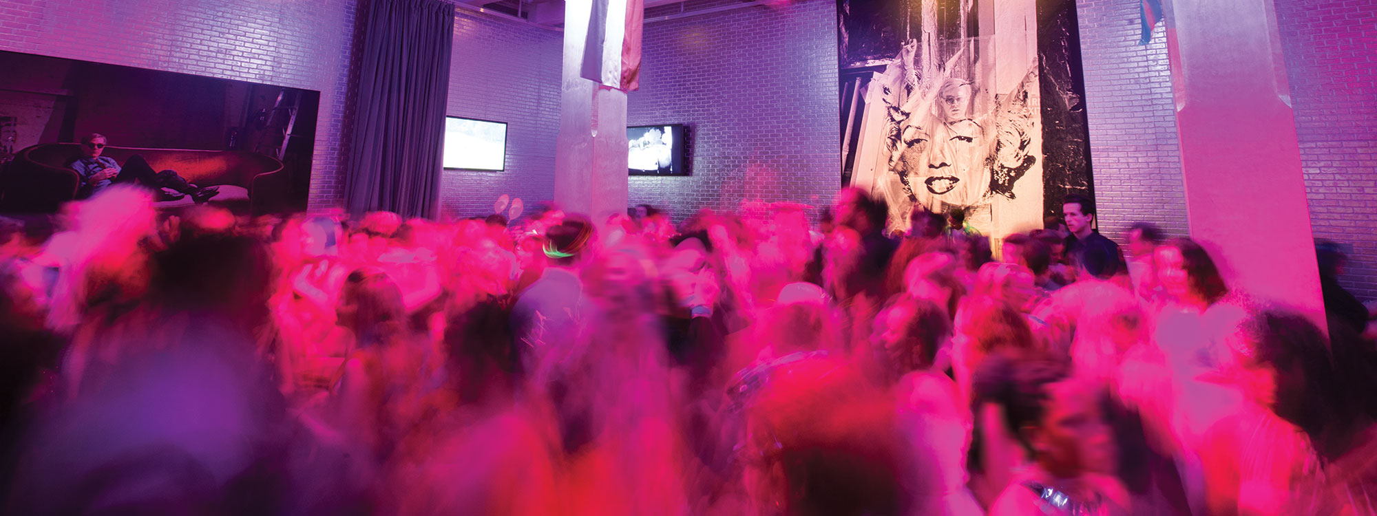 a large group of teens dancing at the Warhol museum