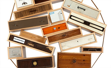 Several drawers stacked in a haphazard way