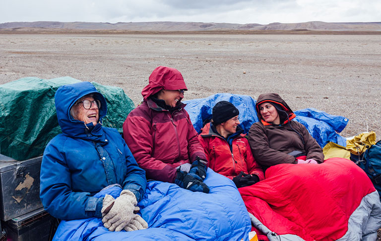 Mary Dawson and 3 others at a camp in the Arctic