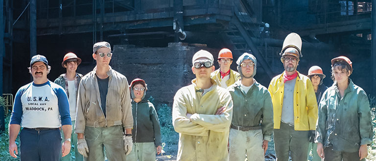 Photo of a group of 6 millworkers