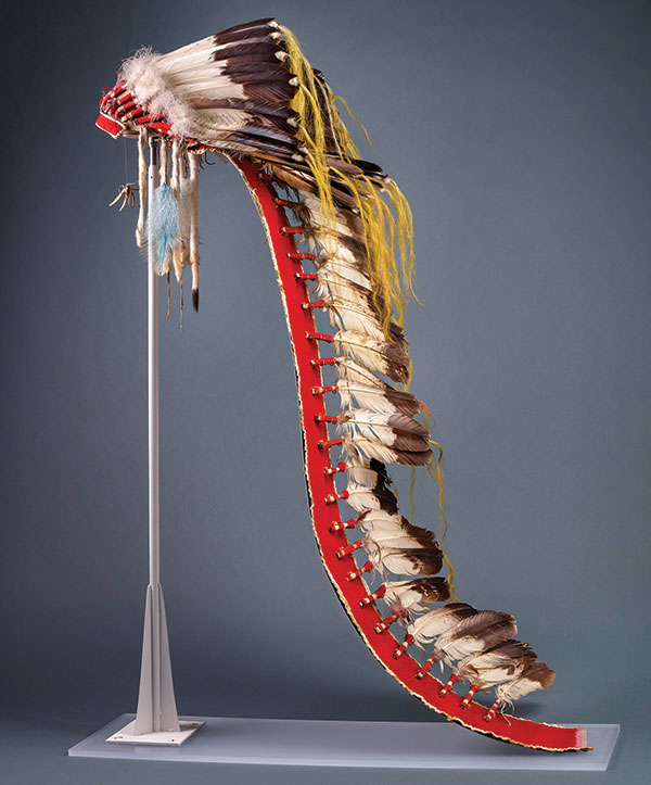 A long war bonnet on display