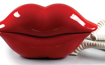 A telephone in the shape of a large pair of red lips.