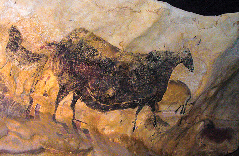 a cave drawing of a cow