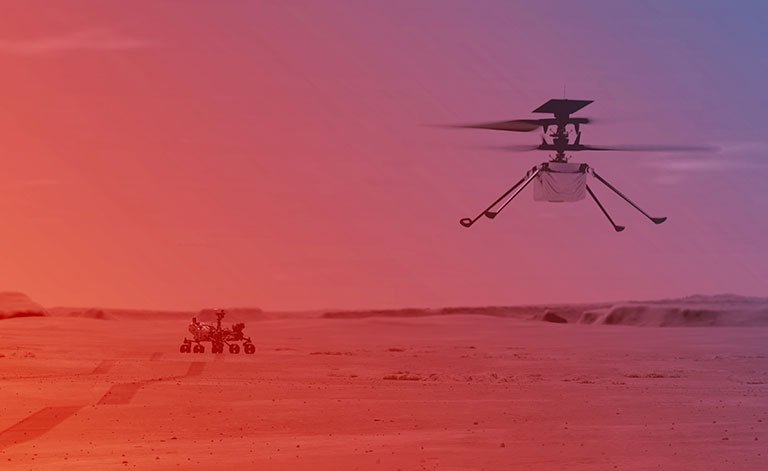 A helicopter hovering over the surface of Mars