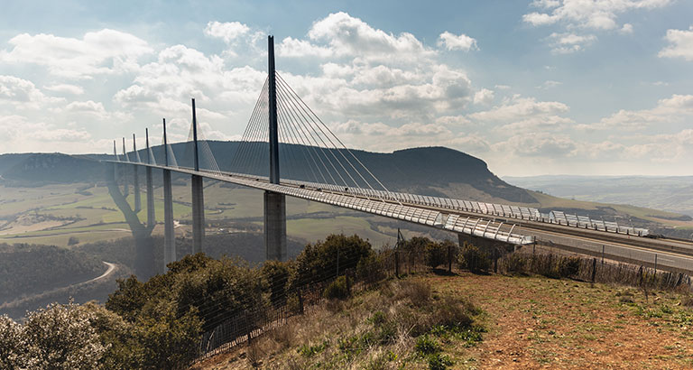 A photo of a long and high bridge.