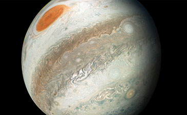A photo of Jupiter showing it's great red spot.