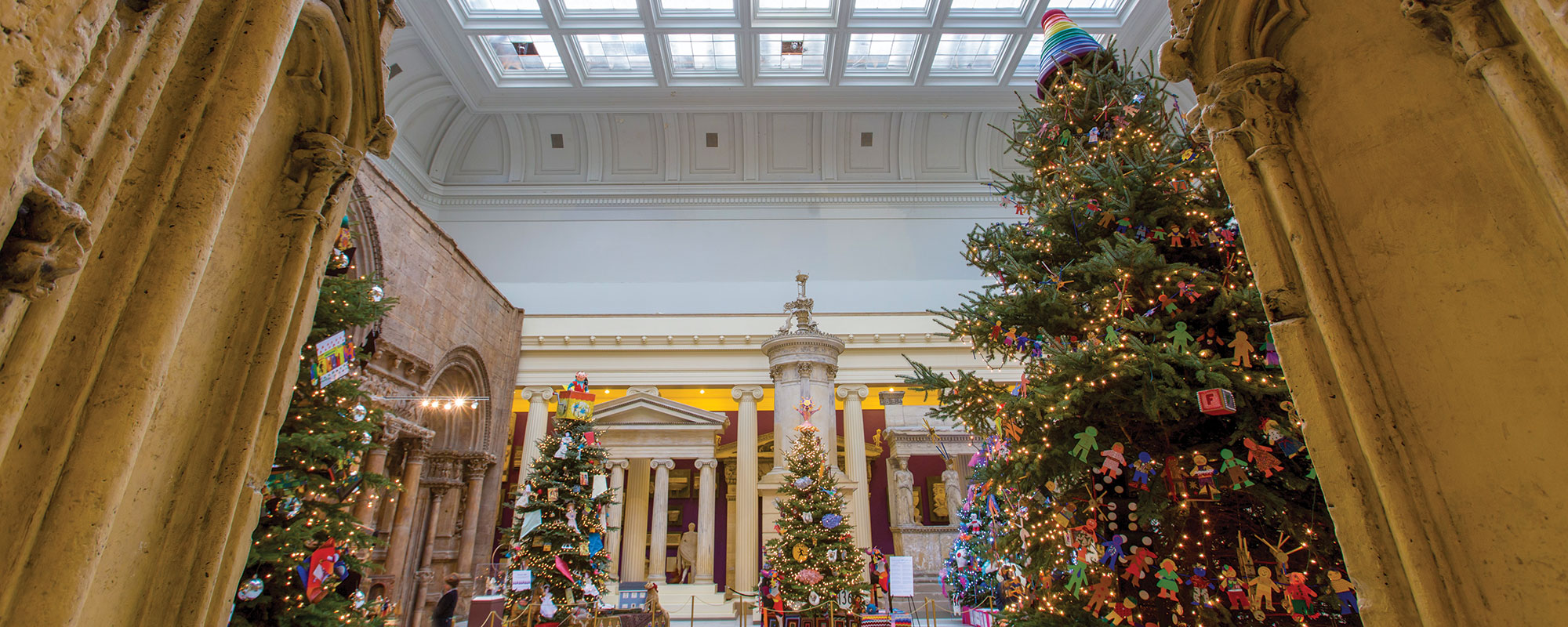 A panoramic view of the holiday trees set up in the hall of architecture.