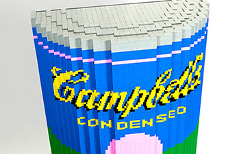 A replica of Andy Warhol's Campbell Soup painting made from legos.