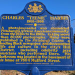 Historical marker honoring Charles "Teenie" Harris, a photojournalist documenting Pittsburgh's African American community from 1930s-1980s.